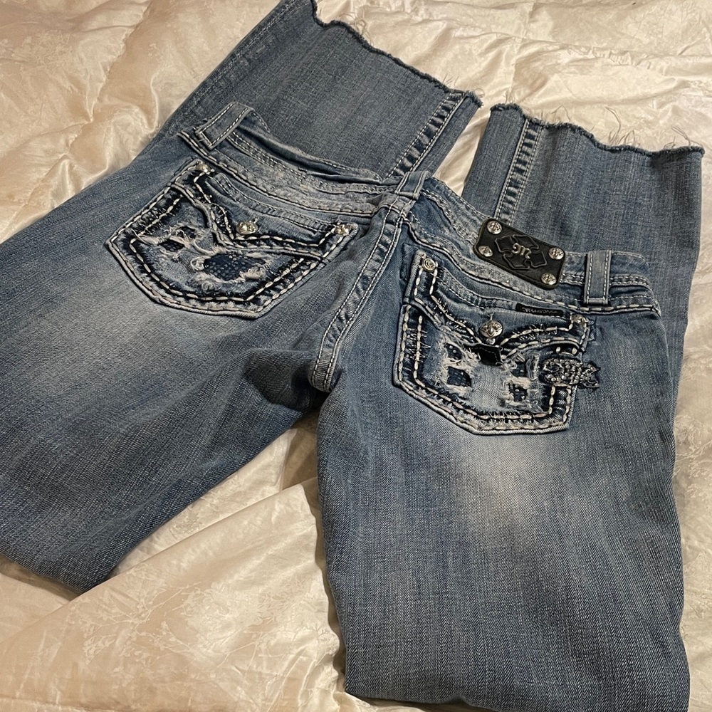Miss Me Boot Cut w/embellishments on pockets -size 31